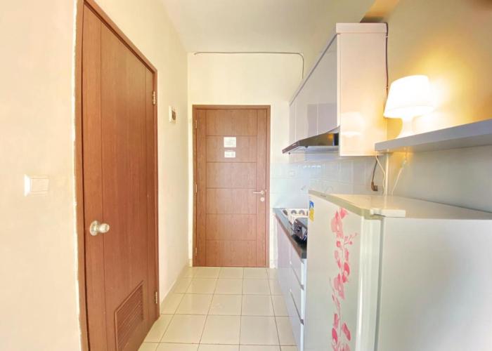 Homey Studio Room at Harvard Jatinangor Apartment By Travelio