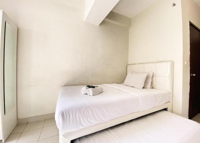 Homey Studio Room at Harvard Jatinangor Apartment By Travelio