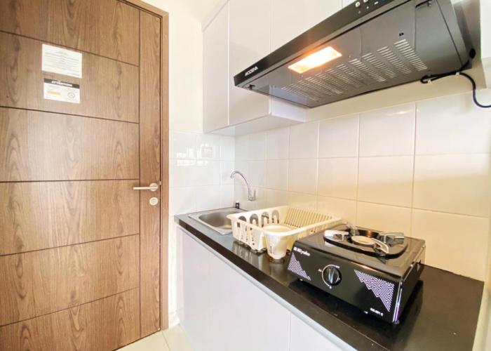 Homey Studio Room at Harvard Jatinangor Apartment By Travelio