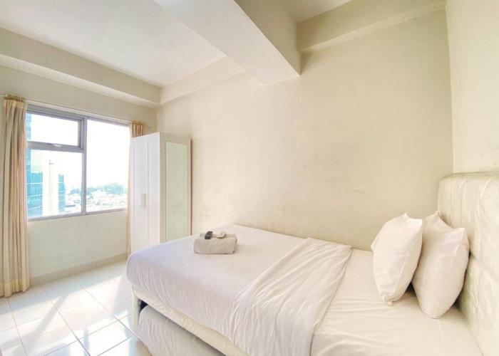 Homey Studio Room at Harvard Jatinangor Apartment By Travelio