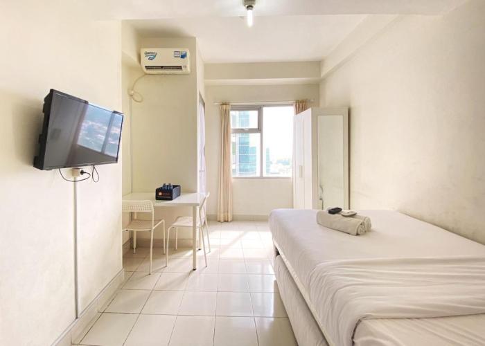 Homey Studio Room at Harvard Jatinangor Apartment By Travelio