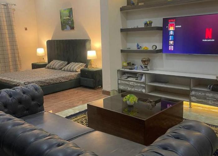 1 Bed Apartment TV Lounge and Equipped kitchen