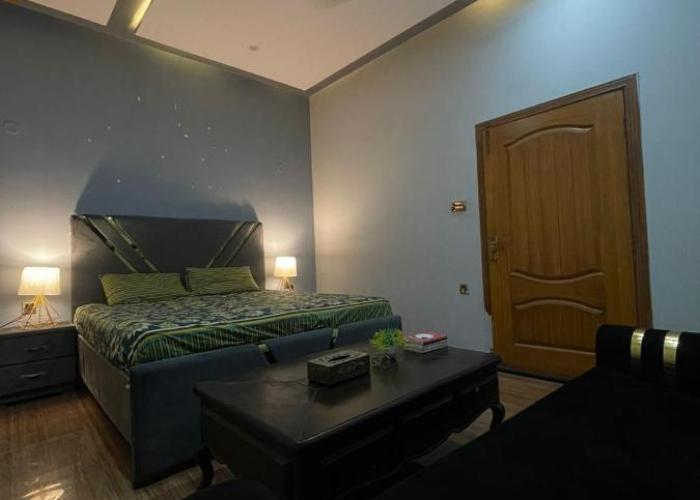 1 Bed Apartment TV Lounge and Equipped kitchen
