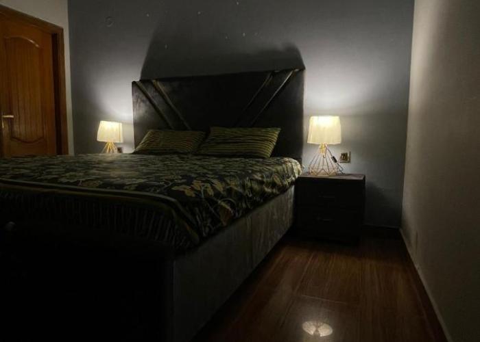 1 Bed Apartment TV Lounge and Equipped kitchen