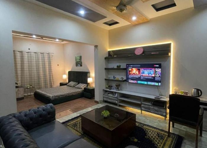 1 Bed Apartment TV Lounge and Equipped kitchen