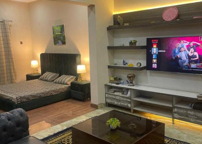 1 Bed Apartment TV Lounge and Equipped kitchen