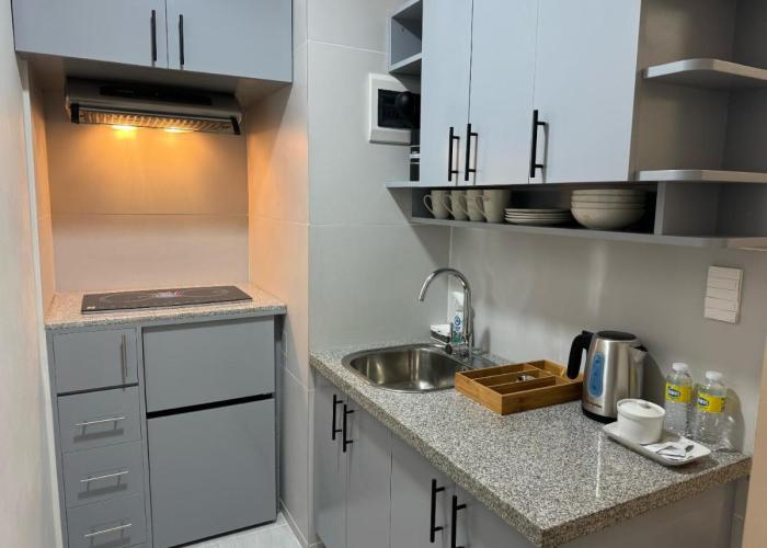 Twin Hearts Residences - RMB Suite Room 217