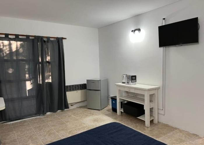 Habitación con baño privado y salida independiente