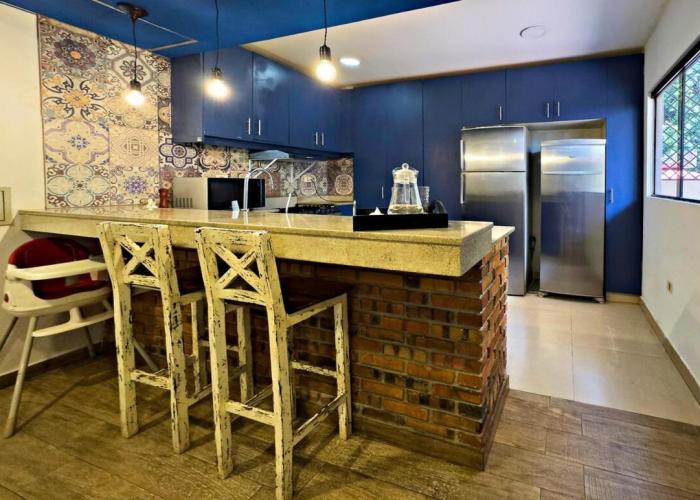 Casa moderna en Villamorra a pasos del Shopping Mariscal Lopez 2Dorm,2 garajes y Wifi