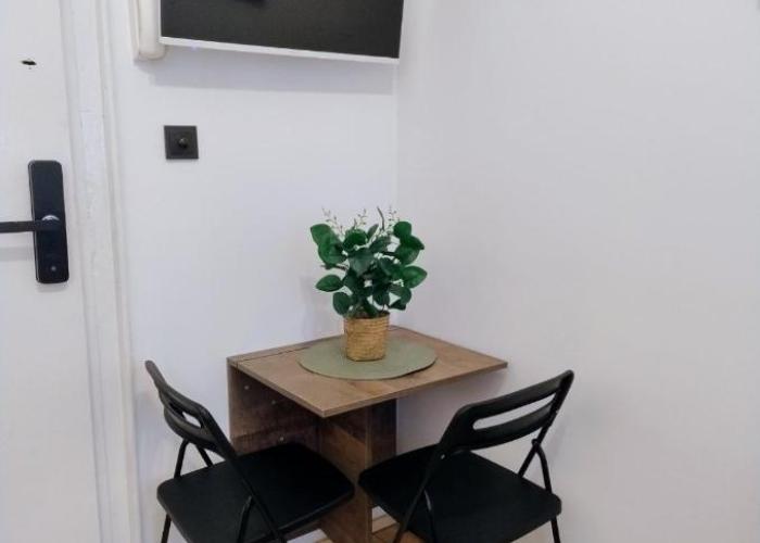 Tiny studio in top center