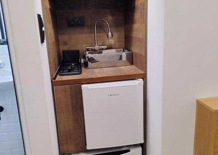 Tiny studio in top center