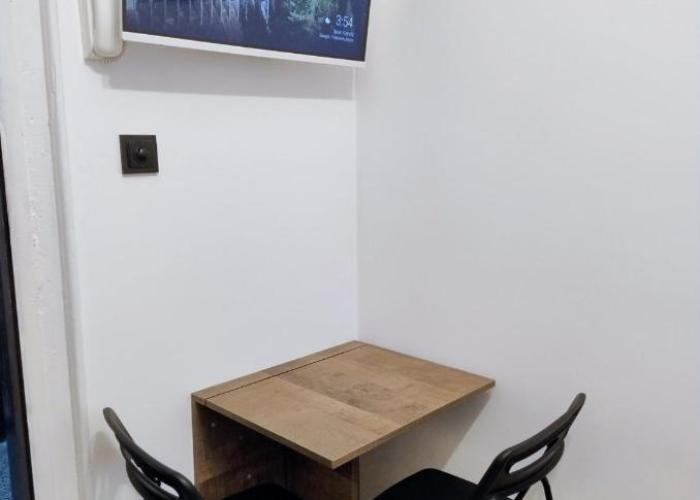 Tiny studio in top center