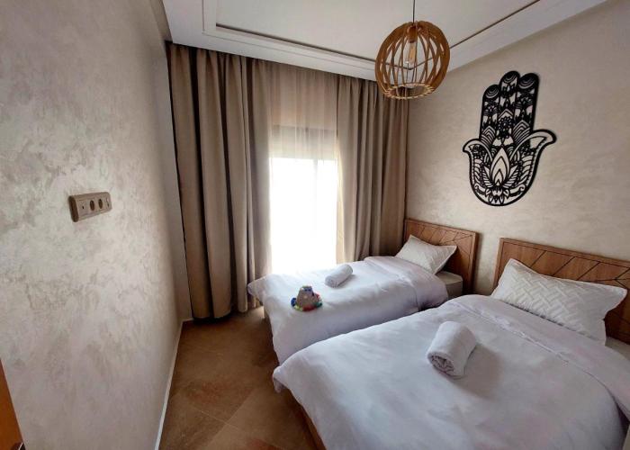 Safari Stay Appart front mer avec piscine