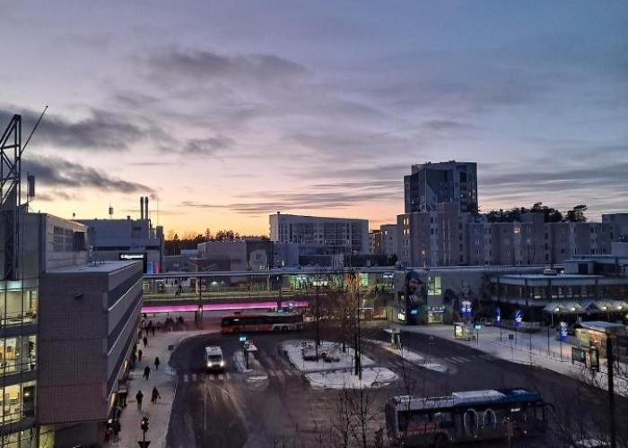 Direct train to Helsinki and airport, near shopping center