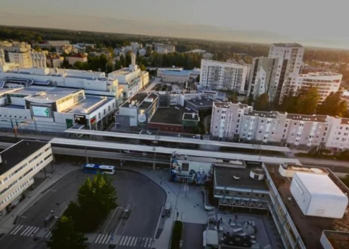 Direct train to Helsinki and airport, near shopping center
