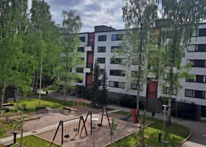 Direct train to Helsinki and airport, near shopping center