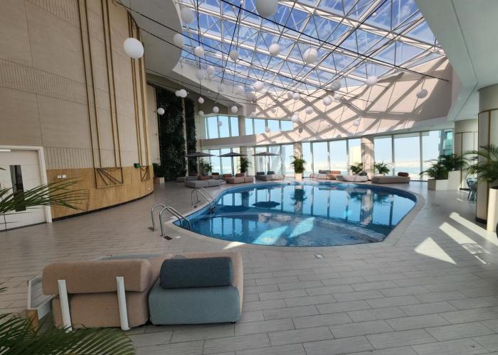 Elegant 1BR with Balcony PearlHouse Luxury Living!