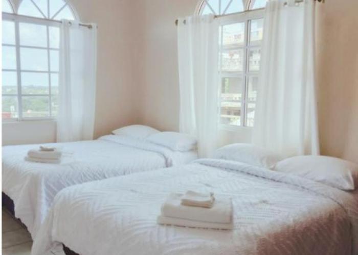 4BR Oasis with Rooftop Lounge offering Scenic Belize Views