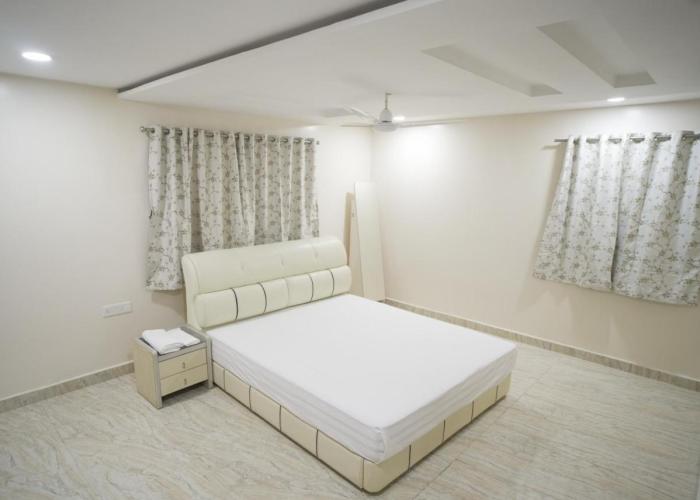 Stay Pride Service Apartments - AC Rooms in Vijayawada - Family & Business Stays
