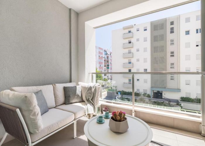 Boutique Soft Tones with Balcony and Secured Garage