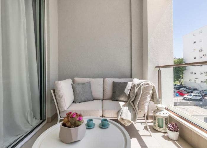 Boutique Soft Tones with Balcony and Secured Garage