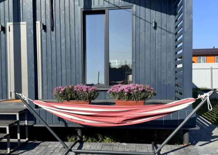 Uyutny dom v stile barnkhaus, s saunoy, nedaleko ot reki Private house