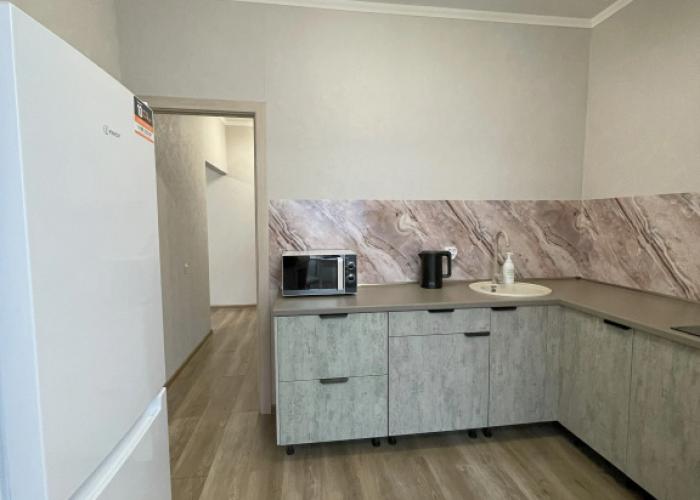 V Tsentre Goroda V 4-M Mikrorayone Flat