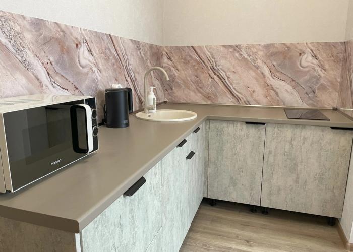 V Tsentre Goroda V 4-M Mikrorayone Flat