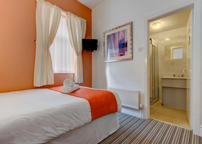 The Sandringham Court Hotel and Apartment