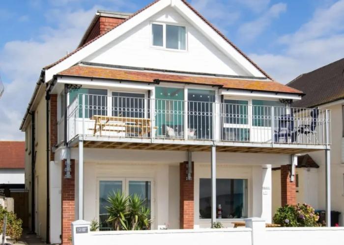 Absolute Beachfront With Decked Garden Oasis and Views